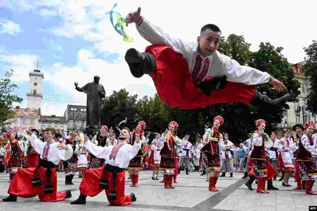 People perform traditional Ukrainian dances during "Dance of My People" celebration on Ukrainian Constitution Day, in Lviv.