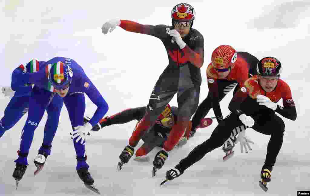 Canada's Maxime Laoun falls during the men's 5000m relay final at the ISU Short Track Speed Skating Championships in Seoul, South Korea.