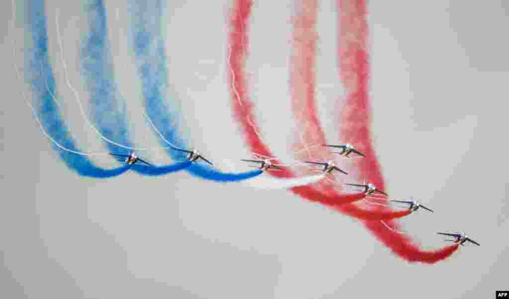 Alphajet aircrafts from the French elite acrobatic flying team &quot;Patrouille de France&quot; perform as they fly over the 701 Air Base in Salon-de-Provence, southern France.