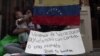 Venezolanos deambulan en San José en busca de unas monedas para seguir su viaje a EEUU 