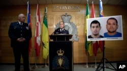 Pomoćnica komesara Ronda Blekmor i šef policije Redžajne Evan Brej na konferenciji za novinare(Foto: Michael Bell/The Canadian Press via AP)