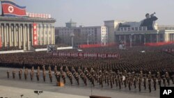 Soldiers and citizens in Pyongyang, North Korea, on Tuesday protested a UN resolution condemning their country's human rights record. (AP Photo/Jon Chol Jin)