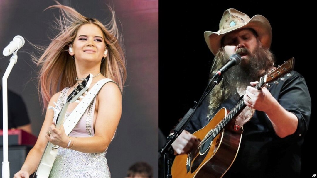 ARCHIVO - Maren Morris actúa en el Bonnaroo Music and Arts Festival en Manchester, Tenn., el 15 de junio de 2019, a la izquierda, y Chris Stapleton actúa durante el Late Night Jam de Marty Stuart en el Ryman Auditorium en Nashville, El 7 de junio de 2018.
