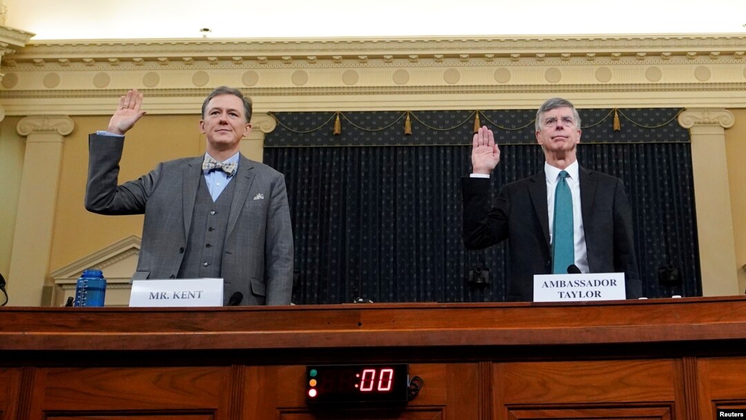 George Kent, a deputy assistant secretary of state and Ambassador Bill Taylor sworn in Nov. 13, 2019 at a House Intelligence Committee hearing as part of the impeachment inquiry.