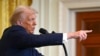 US President Donald Trump takes questions during a press conference with unseen Israel's Prime Minister Benjamin Netanyahu in the East Room of the White House in Washington, DC, on February 4, 2025. (Photo by ANDREW CABALLERO-REYNOLDS / AFP)