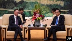 欧盟副主席卡泰宁2018年6月25日会见中国总理李克强（美联社）