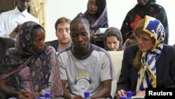 US ambassador Samantha Powers meet with Ebola survivors in Guinea