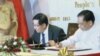 တရုတ် နဲ့ မြန်မာ နည်းပညာဝန်ကြီးများ သဘောတူ လက်မှတ်ရေးထိုးနေကြစဉ်။ (သြဂုတ်လ ၉ ရက်၊ ၂၀၁၃)။