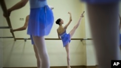Harper Ortlieb, from Mount Hood, Oregon, performs in a ballet class at the Bolshoi Ballet Academy in Moscow, Russia, March 3, 2016.