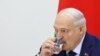 Belarusian President Alexander Lukashenko attends a press conference in Minsk