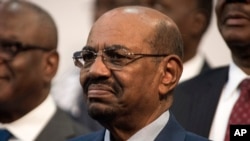 Sudanese President Omar al-Bashir is seen during the opening session of the AU summit in Johannesburg, June 14, 2015. 