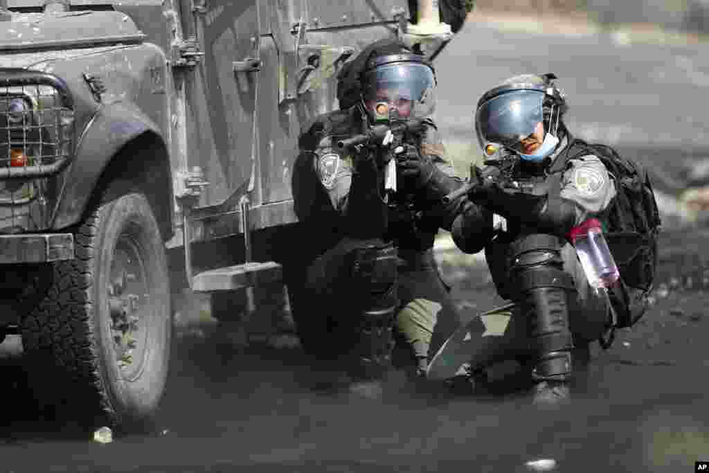 Israeli troops clash with the Palestinian demonstrators following a weekly demonstration against Israeli Jewish settlements, in the West Bank village of Kafr Qaddum near Nablus.