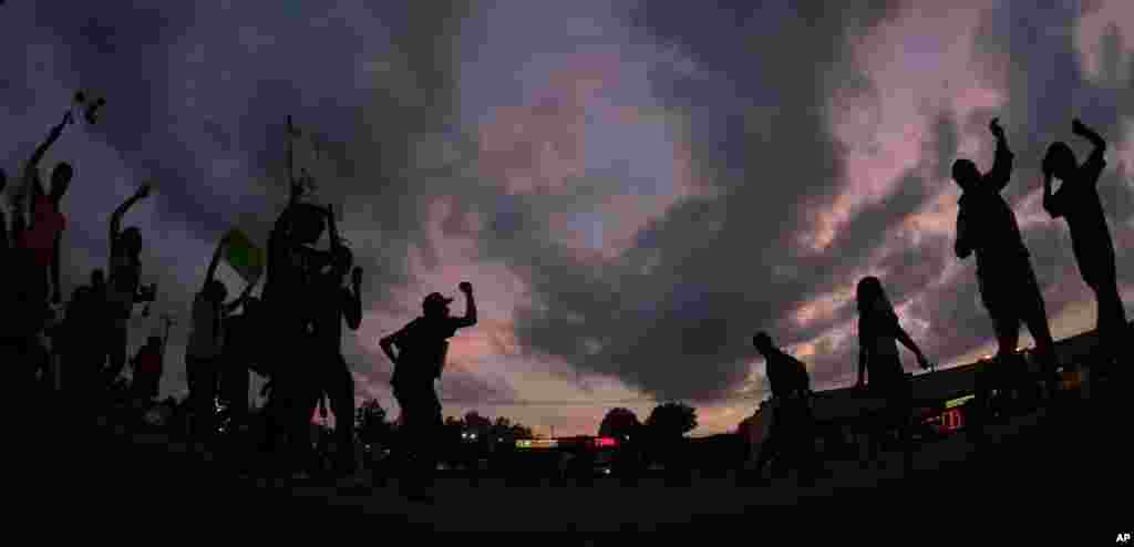 Angry protestors in Ferguson, Missouri, Aug. 18, 2014, for Michael Brown. Brown's shooting has sparked more than a week of protests, riots and looting.