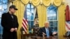 Elon Musk listens as US President Donald Trump speaks in the Oval Office of the White House in Washington, DC, on February 11, 2025.