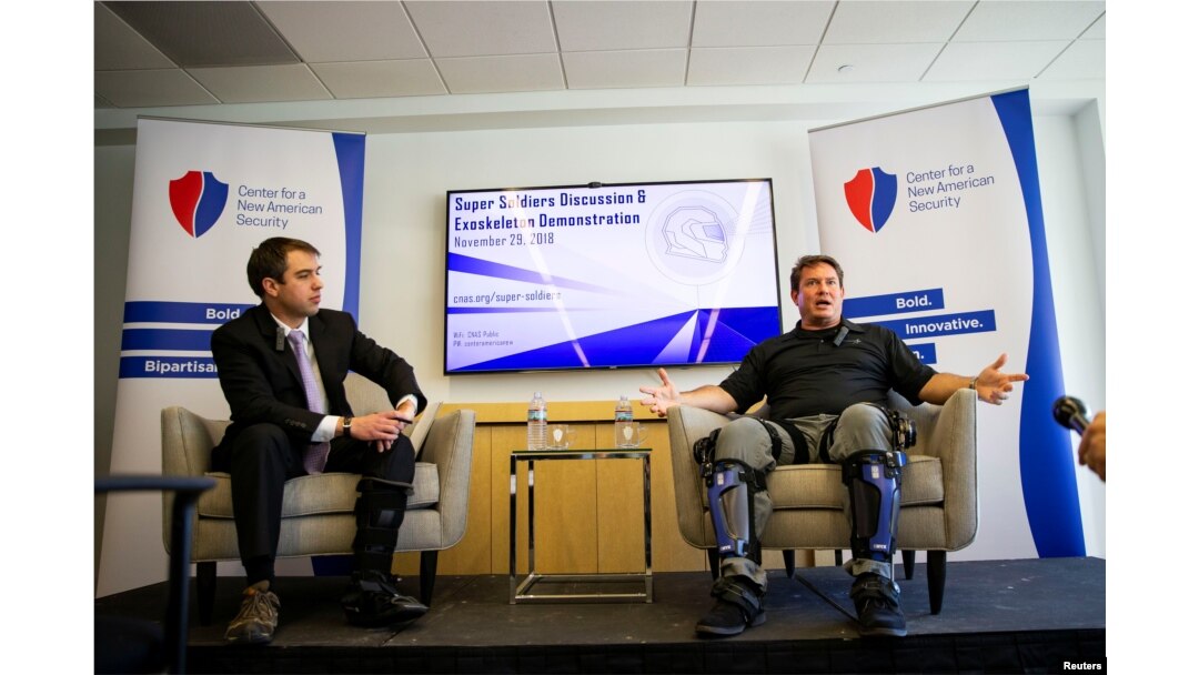 Keith Maxwell, Senior Product Manager of Exoskeleton Technologies at Lockheed Martin, right, speaks alongside Paul Scharre, Senior Fellow and Director of the Technology and National Security Program at the Center for a New American Security.