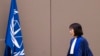 FILE - Judge Tomoko Akane walks before delivering a verdict at the International Criminal Court in The Hague, Netherlands, Nov. 20, 2024.