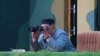 Tư liệu: Lãnh tụ Triều Tiên Kim Jong Un theo dõi cuộc thử nghiệm hai phi đạn đạn đạo tầm ngắn trong một bức ảnh không đề ngày tháng do Thông tấn xã Trung ương Triều Tiên công bố vào ngày 26 tháng 7, 2019.