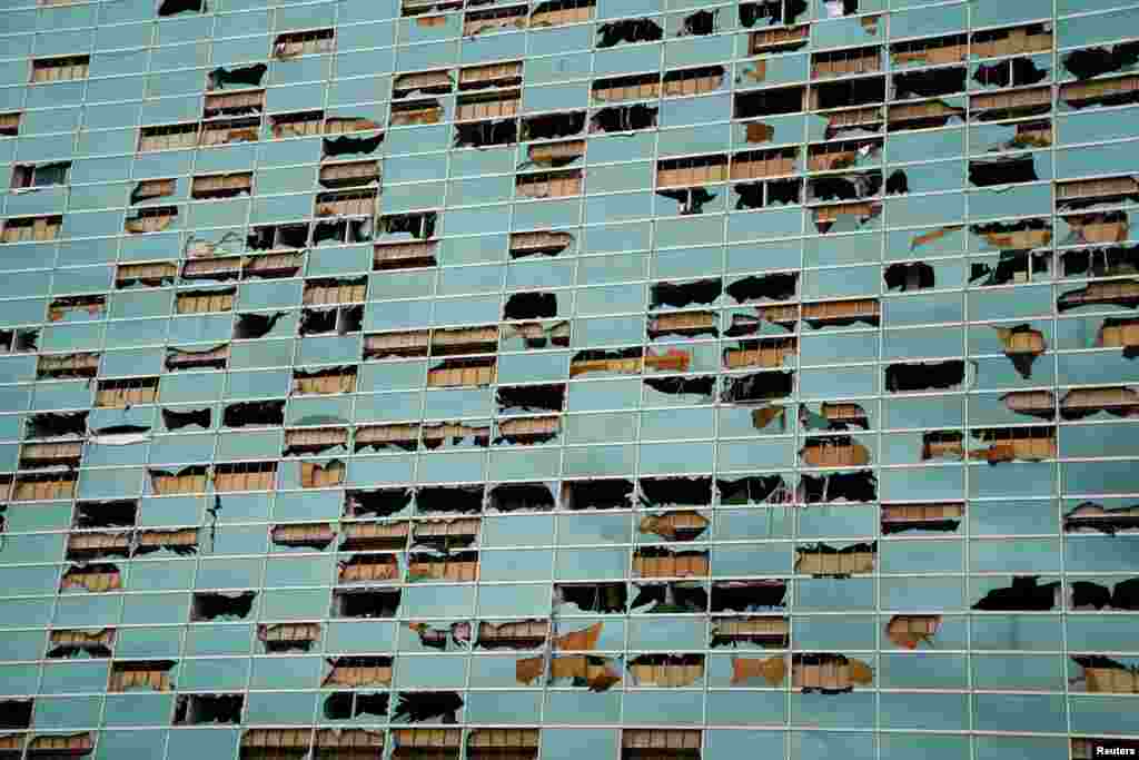 The facade of a building is seen damaged after Hurricane Laura passed through Lake Charles, Louisiana.