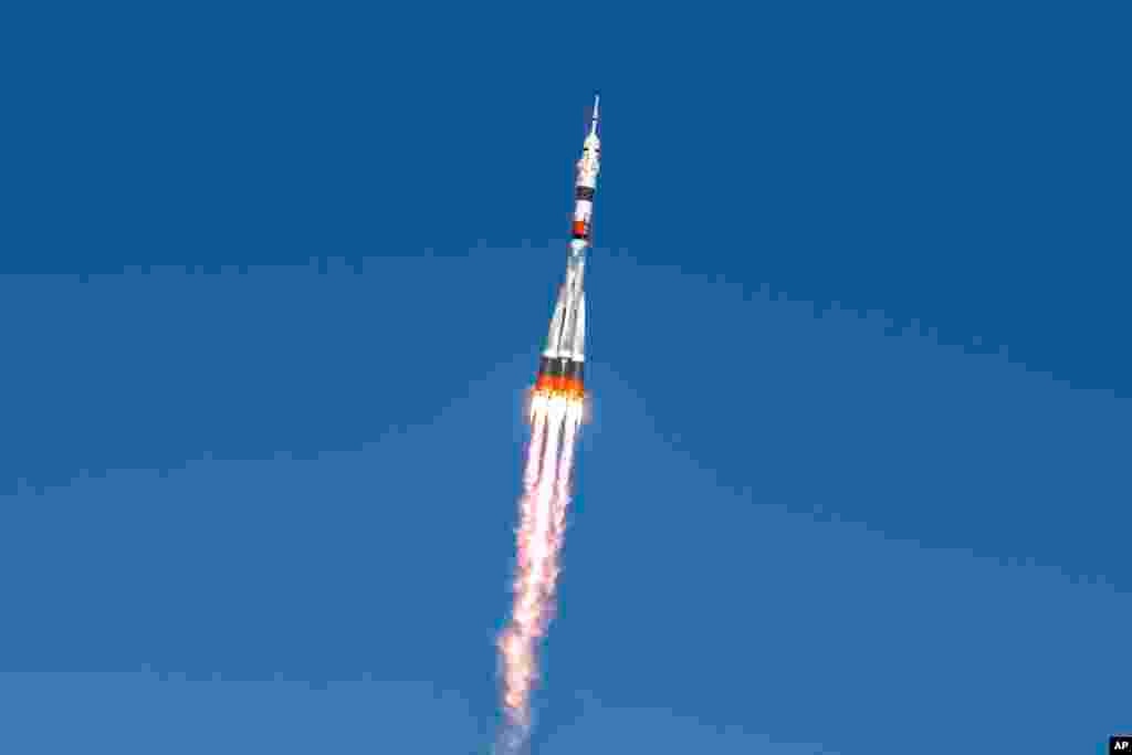 In this handout photo released by Roscosmos Space Agency, Soyuz MS-17 space ship carrying a new crew to the International Space Station (ISS) blasts off at the Russian leased Baikonur cosmodrome, Kazakhstan.