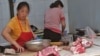 北京农贸市场上，中国猪肉价格猛涨