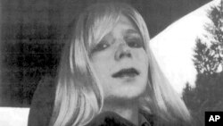 FILE - In this undated file photo provided by the U.S. Army, Pfc. Chelsea Manning poses for a photo wearing a wig and lipstick. Attorneys for the transgender soldier imprisoned in Kansas for sending classified information to the anti-secrecy website WikiL
