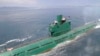 미국의 정치·군사전문 웹진인 '워싱턴 프리 비컨'이 26일 잠수함 발사 탄도미사일(SLBM)을 북한이 보유하고 있다는 관측을 제기했다. 지난 6월 북한 조선중앙통신이 김정은 국방위원회 제1위원장이 동해 잠수함 부대인 제167군부대를 방문, 직접 탑승해 훈련을 지도했다고 보도한 잠수함.