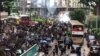 香港民众举行“全球反极权”示威 警方强力遏阻