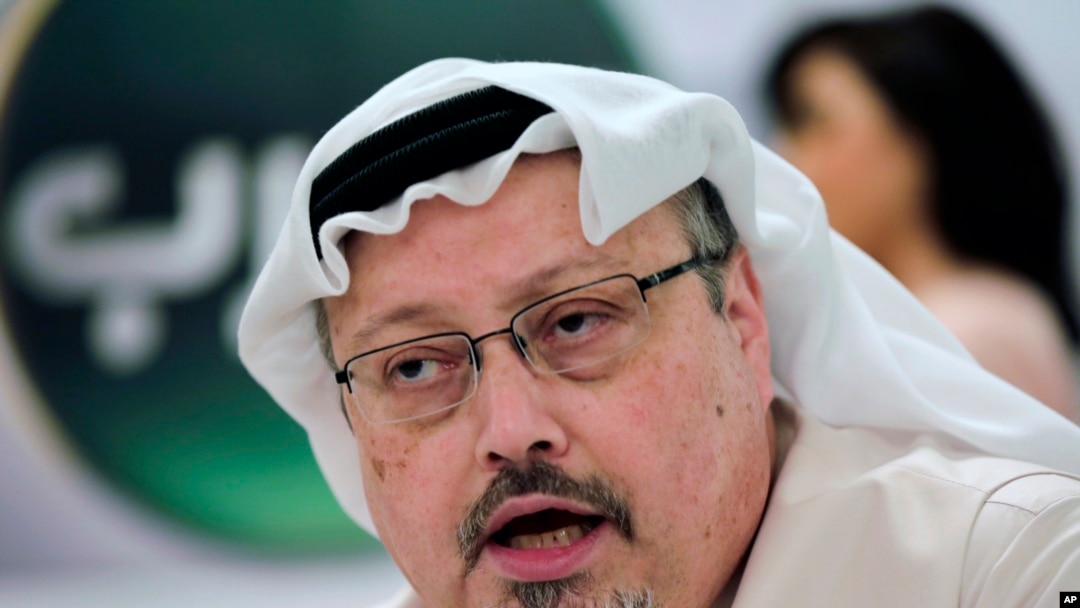 FILE - Saudi journalist Jamal Khashoggi speaks during a press conference in Manama, Bahrain, Feb. 1, 2015. 