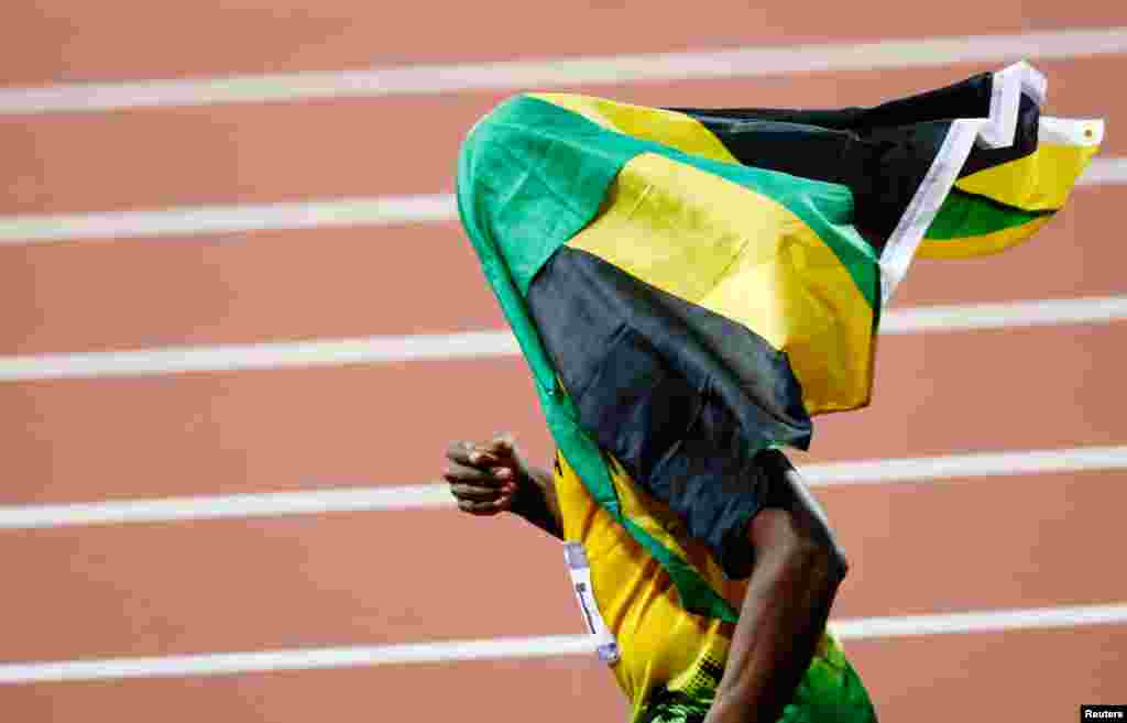 Usain Bolt cũng đoạt huy chương vàng 200 mét nam hôm thứ Năm.