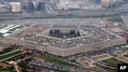 FILE - This March 27, 2008, file aerial photo shows the Pentagon in Washington. The U.S. military wants to expand its use of artificial intelligence in warfare but says it will take care to deploy the technology in accordance with the nation’s values. The